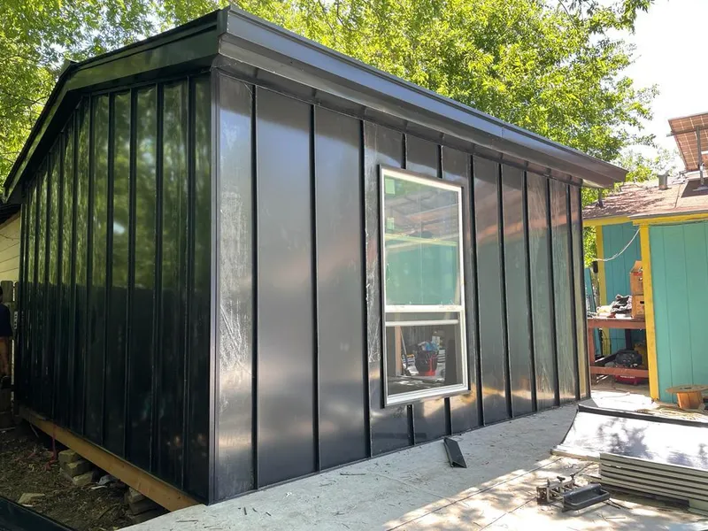 Black standing seam metal wall panels for Roof Inspection in Pennsville